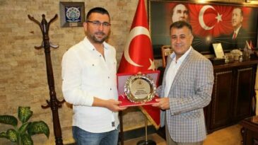 BAŞKAN HACIOĞLU’NA ONURSAL BAŞKANLIK