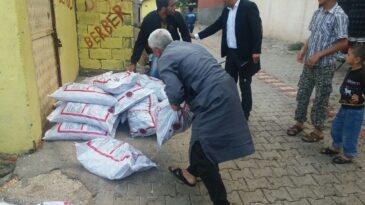 Reyhanlı’da Türk ve Suriyelilere kömür yardımı