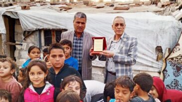 BAŞKAN TEMEL’E ANLAMLI PLAKET